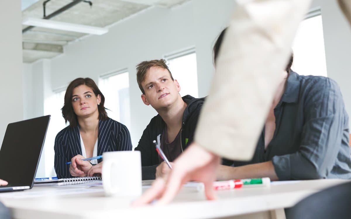 team-listens-at-meeting.jpg